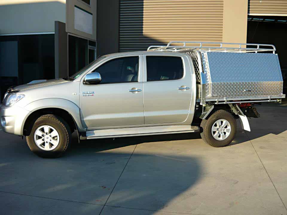 <span  class="uc_style_uc_tiles_grid_image_elementor_uc_items_attribute_title" style="color:#EFF7F9;">Two door canopy on Toyota Hilux</span>