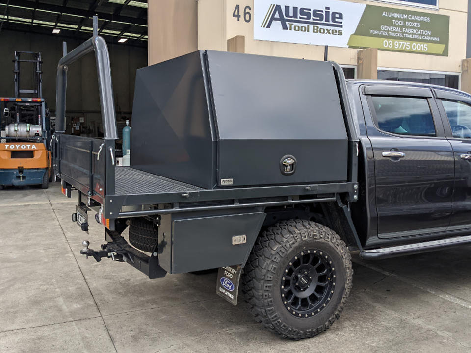 <span  class="uc_style_uc_tiles_grid_image_elementor_uc_items_attribute_title" style="color:#EFF7F9;">2 door powder coated canopy on Ford Ranger</span>